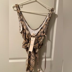 Never been worn swim suit with tags